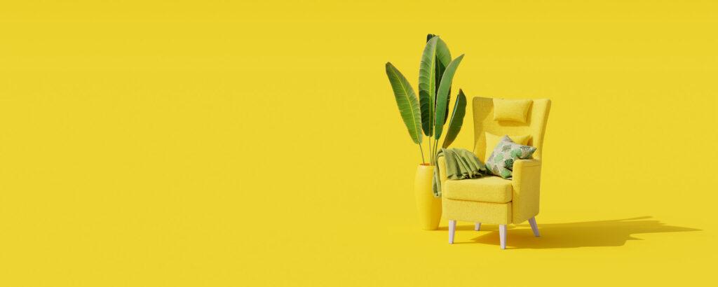 Kreatives Innendesign mit gelber Wandfarbe, gelbem Sessel und gelber Vase.